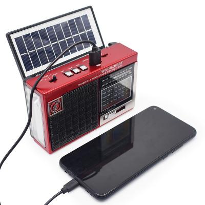 China Portable Home Radio Dynamo Hand Crank AM FM Solar Power Backup Walkman Radio / Mini Flashlight for sale