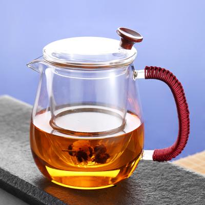 China Small High Clear Sustainable Handblown Borosilicate Glass Teapot With Infuser And Colored Handle for sale