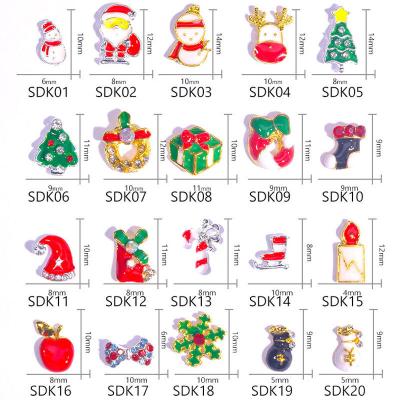 China 3d Christmas Nail Art Enamel Nail Rhinestones Alloy Nails Decals DIY Christmas Sticker Decoration with Santa Snowflake Snowman for sale