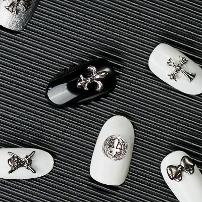 China Nail Art Decorations Punk Metal Retro 3D Rivet Silver Sharp Cross Diamond Antic D Alloy Nail Jewelry Sticker for sale