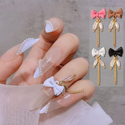 China 3d Nail Pendant Nail Art DIY Decoration Nail Supplier Bow Chain Art Decoration for Women Girls DIY Nail Art for sale