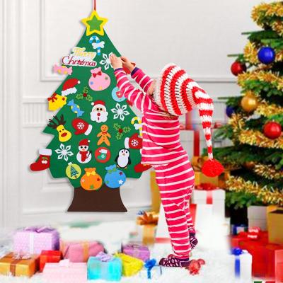 China Fashionable Kids Play DIY Magic Christmas Wall Hanging Wholesale Felt Artificial Christmas Tree Decoration for Home for sale