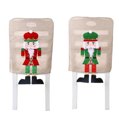 China Holiday decoration & Gift Christmas Decoration Walnut Soldier Chair Cover Home Dress Christmas Chair Cover for sale