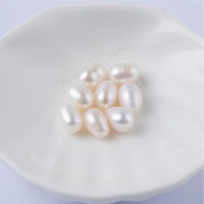 China Wholesale Pearl 7.0*9.0 Half Hole Water Droplets Natural Nucleated Freshwater Pearl Earrings Granular Rice Plant Shaped Rice Shaped for sale