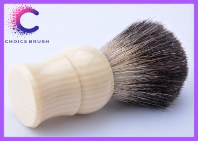 China 22mm Cosmetic faux ivory shaving brush with black bristle badger hair for sale