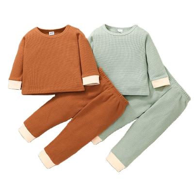 China CIS Australia Cotton Knitted Ribbed Autumn Long Sleeve Waffle Clothes Kids Korean Outfits Sets Simple Kids Boys Pajamas Suits for sale