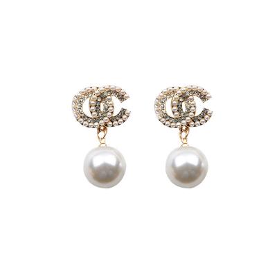 China CLASSIC luxury designer brand earrings new famous popular brands alloy earrings for girls cute women for sale