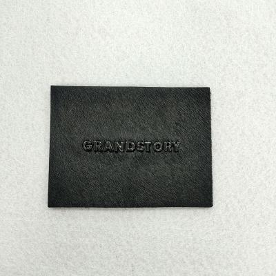 China Viable Factory Direct Custom Leather Label Black Horse Hair Metal Logo Clothing Leather Label for sale