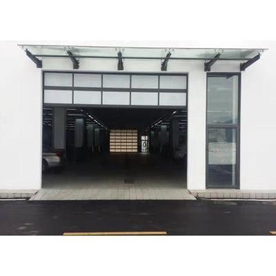 China Modern Custom Height Sectional Aluminum Frame Panel Security Glass Garage Door for sale