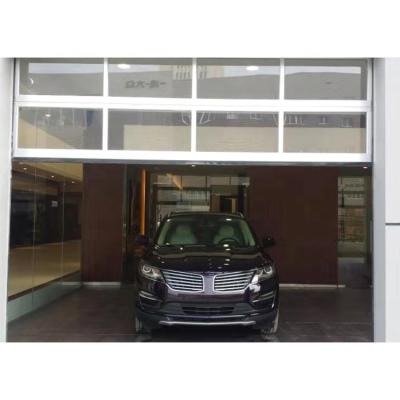 China Modern Easy Installation Clear Automatic Overhead Glass Garage Aluminum Electric Sliding Sectional Speed ​​Door for sale