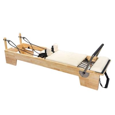 China Durable Pilates Home Yoga Exercise Workout Fitness Equipment Machine Reformers Aluminum Wood With Track for sale