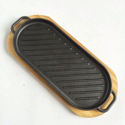 China Hot Sale Cast Iron Sizzler BBQ Grill Non-Stick Viable Pan Griddle Plate Sizzling Hot Dish with Wooden Tray Base for sale