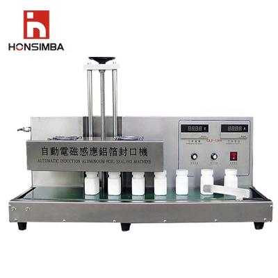 China HONSIMBA GLF1300 Hot Sale Food Handleability Table Inexpensive Table Model Electromagnetic Sealing Machine for sale