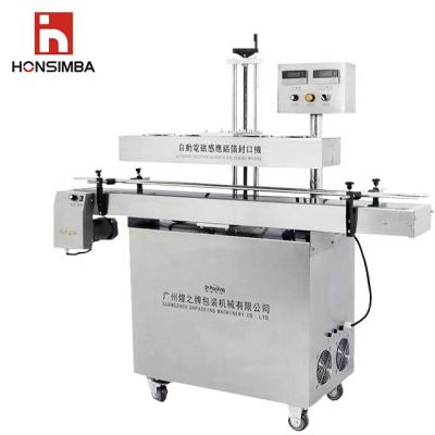 China HONSIMBA GLF2100 Hot Sale High Quality Energy Saving Economical Vertical Electromagnetic Sealing Machine for sale