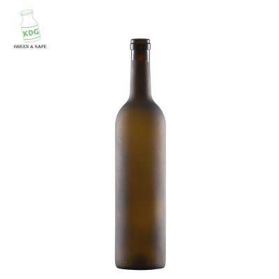 China Original Wholesale Brown 750ml Colored Glass Beverage Liquor Container Frosted Round Glass Bottle With Cork for sale