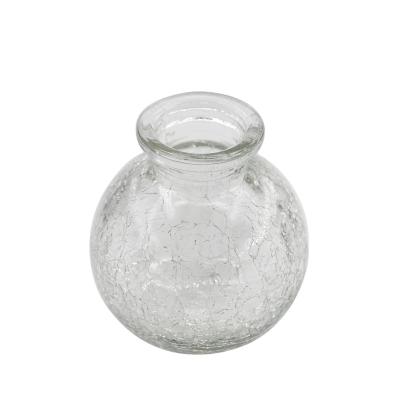 China High Quality Ball Shaped Gift Slot Pattern Small Glass Bottle Manufacturers for sale