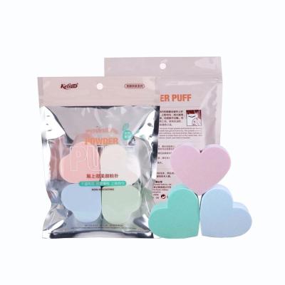 China Beauty care make tools keli new products foundation cream and baby nice powder puff with handle with 2020 new arrivals beauty for sale