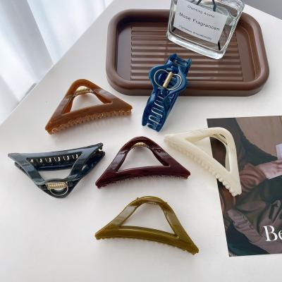 China Wholesale high quality simple triangle hair hollow fashion DOWELL ABS plastic hair claw clips of accessories for sale