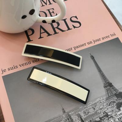 China DOWELL fashion medium hair clips spring clip French simple black and white hair accessories wholesale for sale