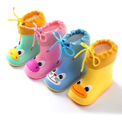 China OEM Lightweight Kids Cartoon Wide Main Frenulum PVC Lace Up Rain Boots For 1-8 Years Old Boys And Girls for sale