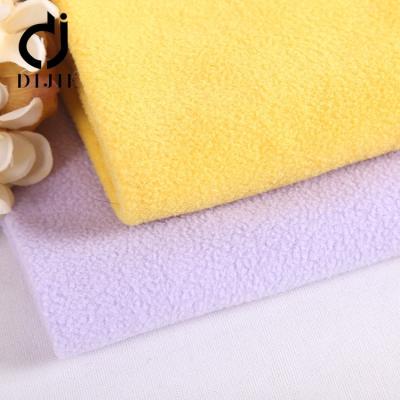 China Anti-Static Cosmetics Warm Dragon Printed Comfortable Plush Loose Flannel Fabric for sale