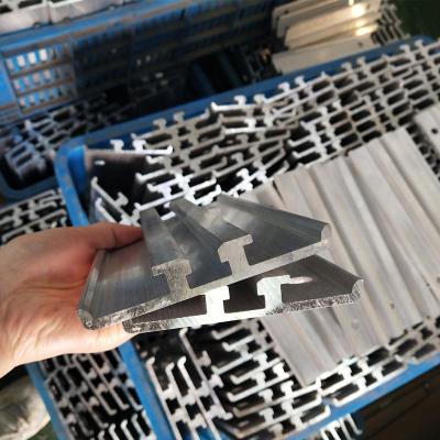 China Custom 6050mm t section 6050mm aluminum slot rail decorations extrusion 6063 aluminum extrusion profile T66 for sale