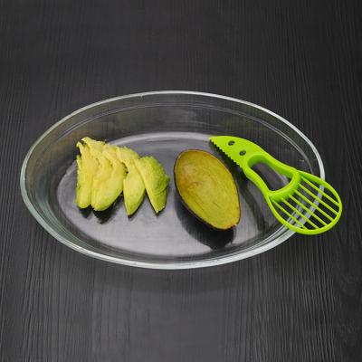 China Viable Kitchen Accessories Fruit Tools 3 In 1 Multifunctional Avocado Slicer Avocado Cutter PP Material Peeler for sale