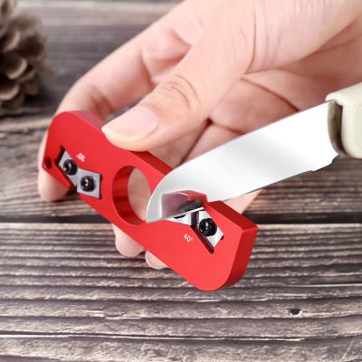 China Viable Outdoor Camping Finger Pocket Carbide Multifunctional Portable Knife Sharpener Hole Mini Knife Sharpener Outdoor for sale