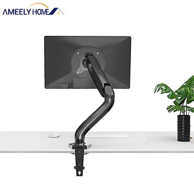 China Modern Computer Monitor Bracket Swivel Angle 360 ​​Free Standing Spring Computer Monitor Arm Stand Metal Gas Bracket for sale