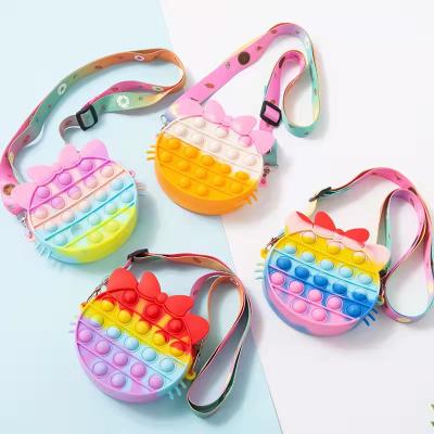 China Daily Hot Sell Rainbow Kids Mini Zipper Pop Purses Outdoor Toss Push Bubble Coin Pouch Silicone Shoulder Bag For Girl for sale