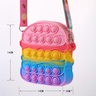 China Daily hot sale fidgety person coin purse relieve stress purse sensory popping bubbles rainbow silicone fidgety bags for sale