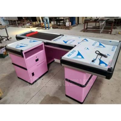 China Cheap regular and electric models shop supermarket cashier counter table wooden design with small drawer for sale for sale