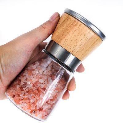 China Sustainable Product Beech Wooden Head Glass Body Hot Spice Bottle Wooden Salt And Pepper Grinder Set for sale