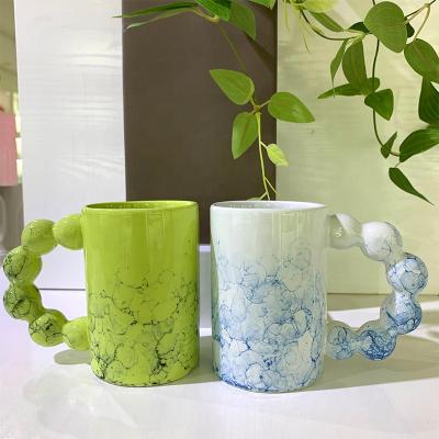 China Popular Stylish Design 250ml Cream Ceramic Coffee Mug Good Quality Viable Mark Cup Milk Mug With Handle for sale