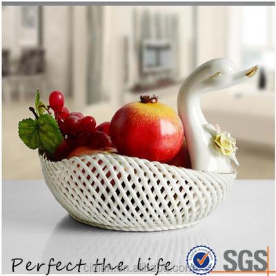 China Special Excellent Quality Handmade Ceramic Porcelain SOCKET CAKE Design White Fruit Basket for sale