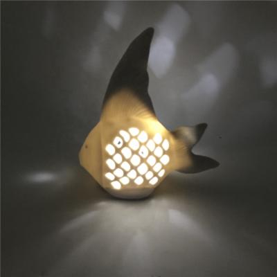 China Ceramic LED Night Light For Decoration Tropical Fish Shape Hollow Out Porcelain Ceramic Lamp LED Night Light for sale