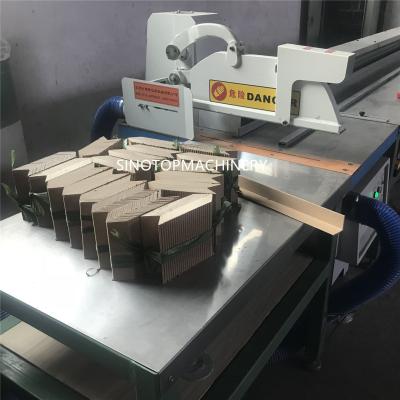 China Automatic feeding high efficiency cardboard edge protector cutting tool machine for sale