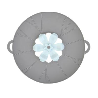 China Rotating Spill-Proof Silicone Rotating Spill-Proof Kitchen Basket Sustainable Flower Shaped Cool-Keeping Instruments for sale