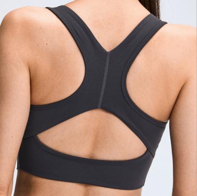 China Breathable Sports Bra For Backless Sleeveless Criss Cross Back Bra Women Yoga Crop Top Running Camisole for sale