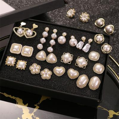 China Vintage High Quality VKME Simple Baroque Irregular Crystal Pearls Stud Earrings For Women Gold Plated Pearl Hanging Earrings for sale