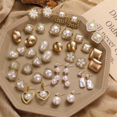 China High Quality VKME Hot Selling Pearl Stud Earrings For Women Crystal Hanging Pearl Hoop Earrings Baroque Irregular Gold Plated for sale