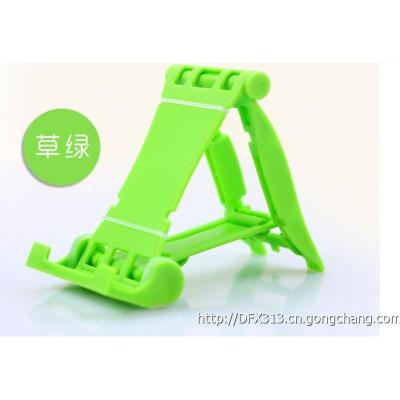 China Green Desktop Silicone Mobile Phone Stand Metal Snap for Smartphone Tablet PC for sale