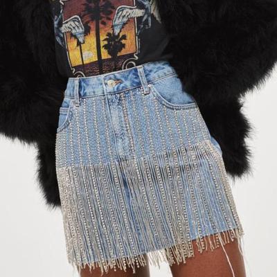 China Handwork High Waisted Cotton Ladies Fashion Sexy Blue 100% Blue Denim Anti-Static Beaded Tassel 5 Pockets Mini Skirts for sale