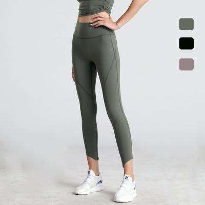 China Hot sale QUICK-DRY double-sided sanding naked yoga pants no embarrassing lines elastic fitness sports hip-lifting nine-point pants for sale