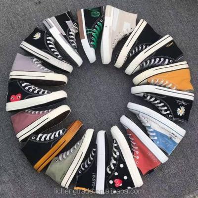 China Fashion trend wholesale ready to ship mixed styles fashion casual sneaker women cheap second-hand shoes used canvas shoes sepatu murah for sale