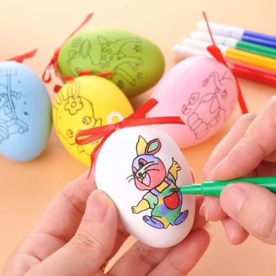 China Easter Decoration DIY Plastic Easter Eggs Kids Colors Cartoon Painting Egg Toys Assorted Ball For Happy Eater Party Home Decor for sale