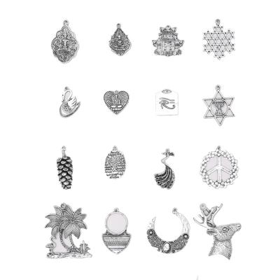 China Factory Direct Sales Zinc Alloy Hollow Carved Abstract Style Multi-colors Charms Earrings Accessories Free Sample for sale