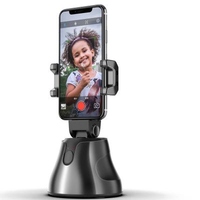 China PORTABLE 360 Rotating Motion Sensor Face Detection Phone Holder Stand for sale