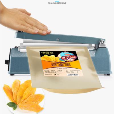 China Small Mini Handheld Porcelain Food Popcorn Food Foil Plastic Pouch Heat Sealer Machine Hot Sealer Machine for sale