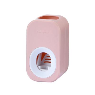 China Stocked Accept Custom Logo Wall Mounted Toothpaste Squeezer, Bathroom New Hands Free Toothpaste Vending Machine for sale